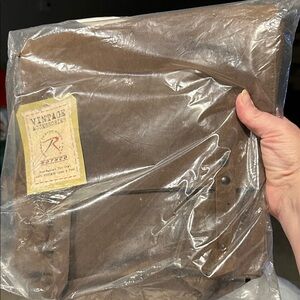 This item is a Rothco Vintage Canvas Medic Bag in brown